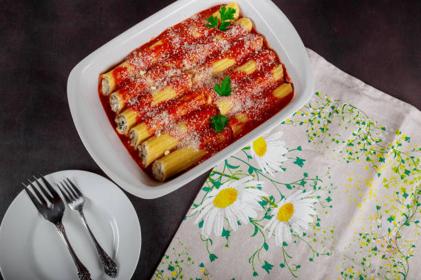 istock Cannelloni with spinach and ricotta meat tomato sauce 1124238698