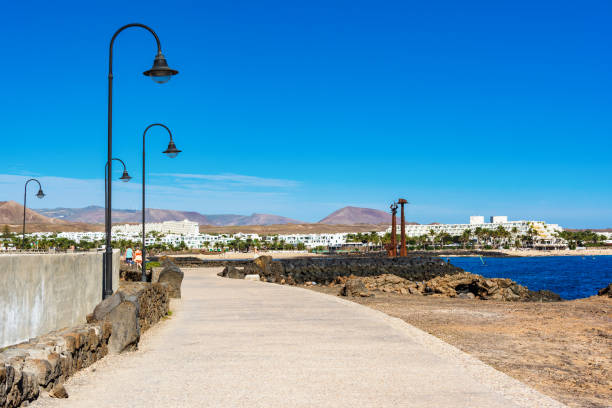 istock Las Cucharas beach in Costa Teguise, Lanzarote 1124238840