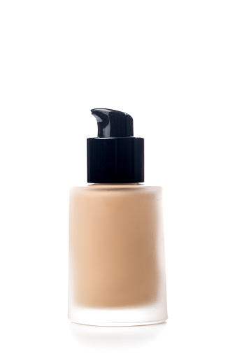 Liquid makeup foundation cream isolated on white background