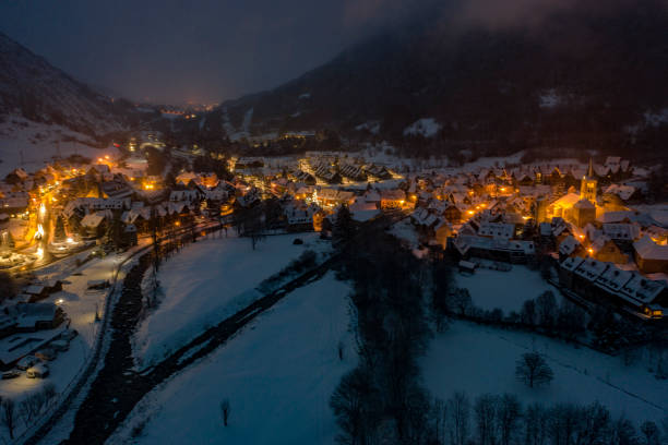 istock Winter village by night 1124241728