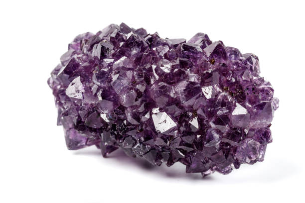 istock Macro mineral stone Amethysts eye crystals on white background 1124242491