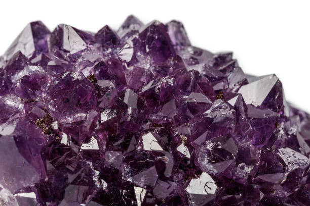 istock Macro mineral stone Amethysts eye crystals on white background 1124243156