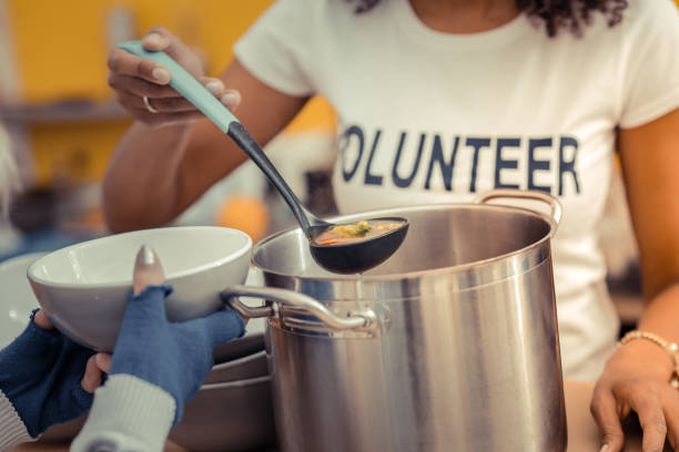 istock Close up a ladle being filled with soup 1124243161