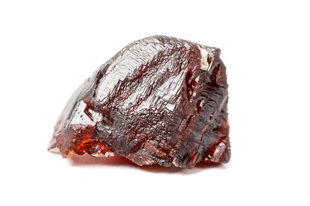 istock Macro mineral stone Garnet Spessartine on a white background 1124243342