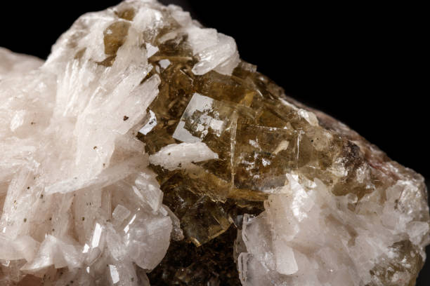 istock Macro mineral stone Baryta On Fluorite On a black background 1124245023