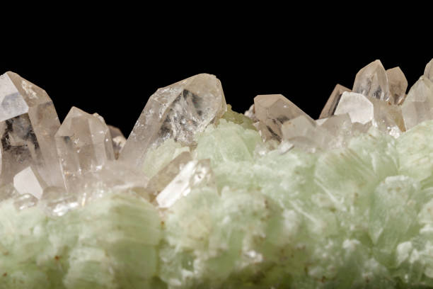 istock Macro mineral stone Prehnite quartz on a black background 1124245600