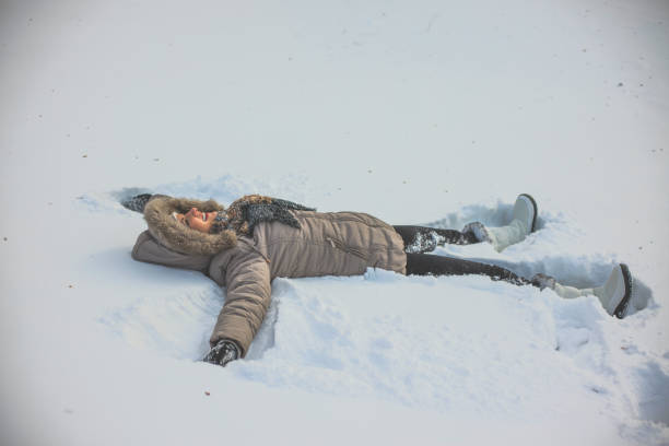 istock Woman have winter fun 1124245684