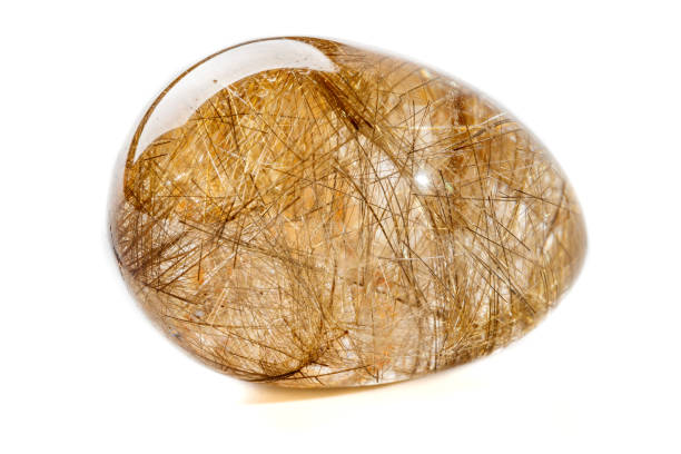 istock Macro mineral quartz hairy stone, quartz with rutile on a white background 1124245743