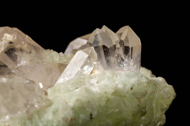 istock Macro mineral stone Prehnite quartz on a black background 1124245920