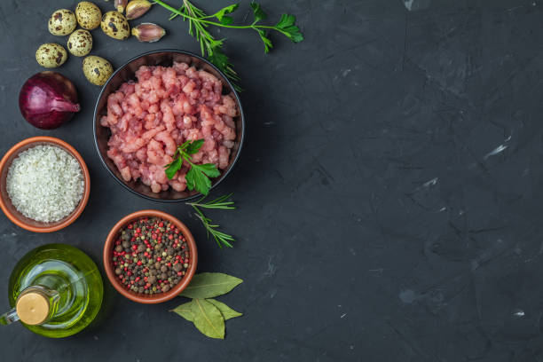 istock Homemade minced meat in a black bowl over dark slate 1124247777