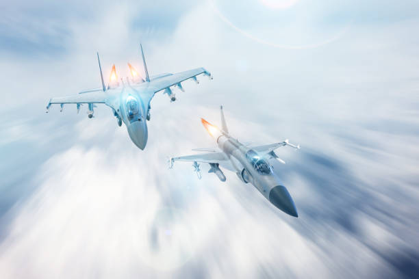 istock Fighter jet intercepts accompanies another fighter. Conflict, war. Aerospace forces. 1124249073