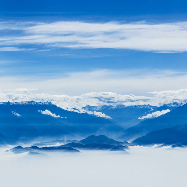 istock Andes Mountains Poking Through the Clouds in Peru 1124253315