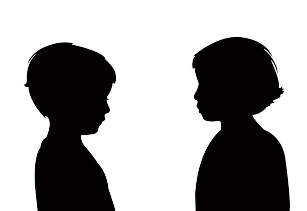 dwoje dzieci robi czat, wektor sylwetki - human face child little boys human head stock illustrations