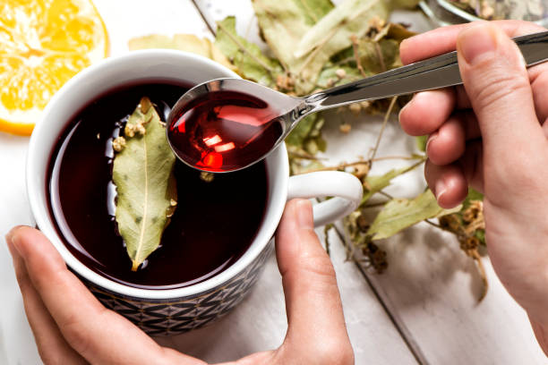 istock Dried Herbs With Cup Of Herbal Tea 1124256030