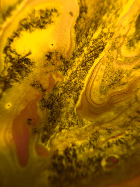 istock Golden colored abstract paint background. 1124256075