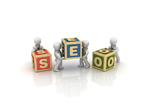 Business People Carrying SEO Buzzword Cubes - White Background - 3D Rendering