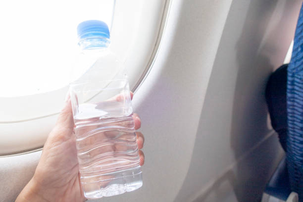 istock A bottle of water for passenger to drink on the aircraft to avoid dehydrate 1124265746