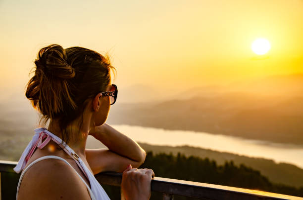 istock Girl standing on deck of Pyramidenkogel viewing tower in Carinthia. 1124270013