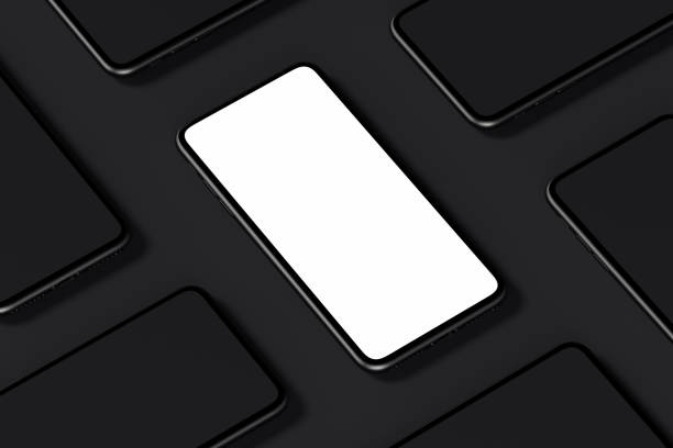 istock Mobile phones with blank screens on black background. 3d rendering. 1124272356