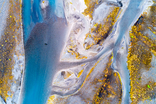 Abstract pattern of braided Hvita River from above in South Central Iceland.