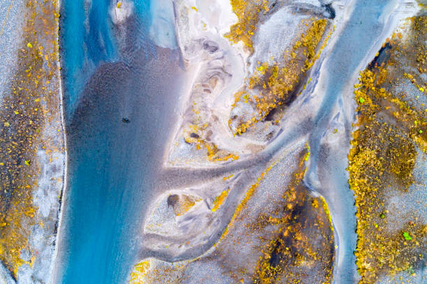Aerial Shot of Braided River in South Central Iceland Abstract pattern of braided Hvita River from above in South Central Iceland. flood plain photos stock pictures, royalty-free photos & images