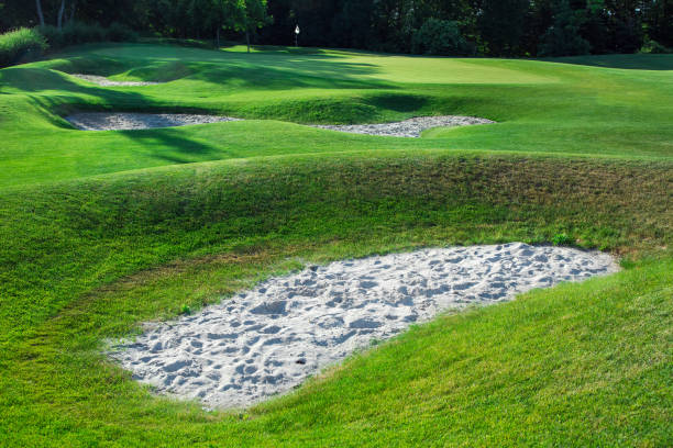 istock golf course hilly terrain with Sand traps on the golf course, close up nobody. 1124280931