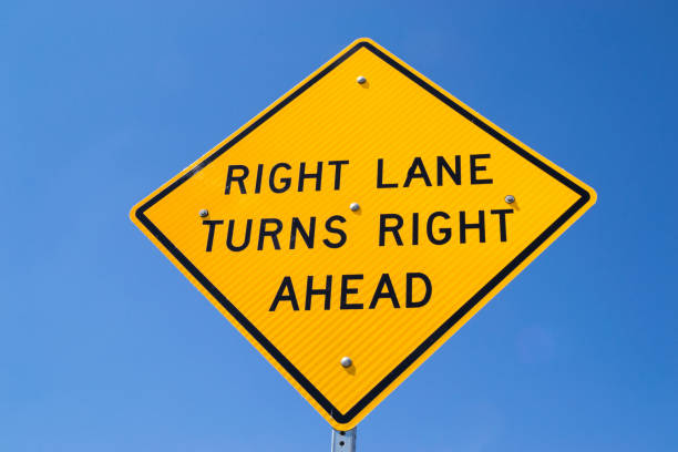 istock Right land turns right street sign 1124287076