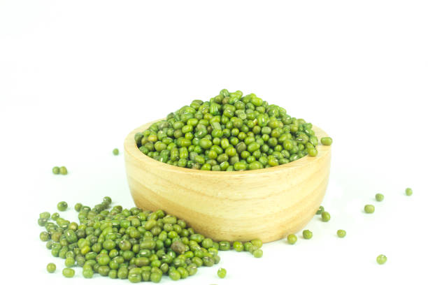 istock Green beans in a wooden bowl on a white background. 1124290041