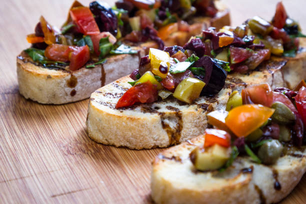 istock Home made tomato and olive bruschetta 1124290325