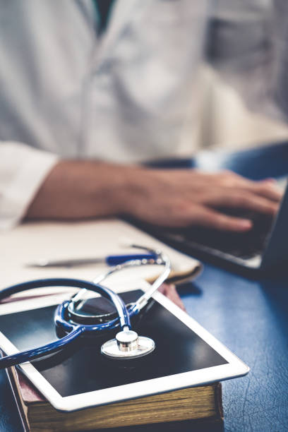 istock Doctor working in hospital office. 1124295613