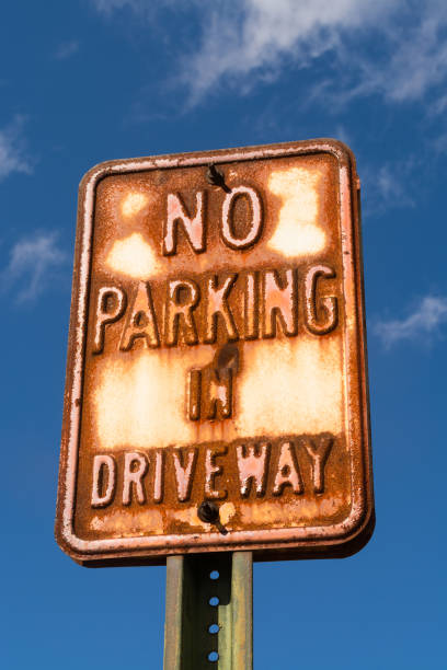 istock No parking in driveway sign 1124297045