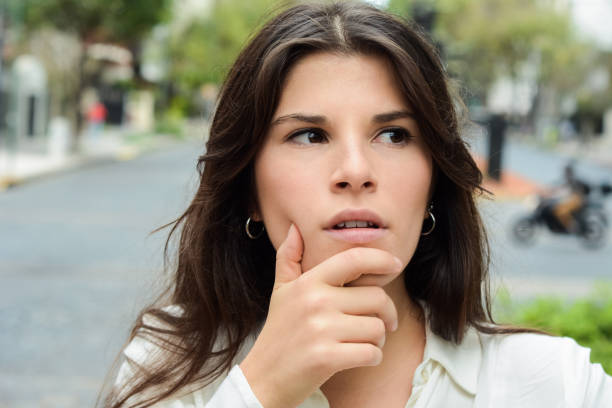 istock Beautiful thoughtful woman 1124297266
