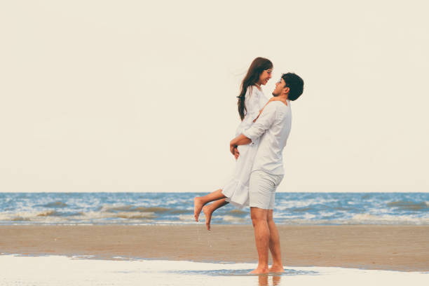 istock Couple going honeymoon on tropical beach in summer 1124297554