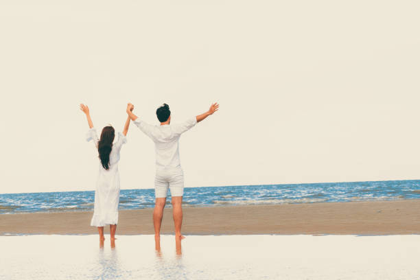 istock Couple going honeymoon on tropical beach in summer 1124297556