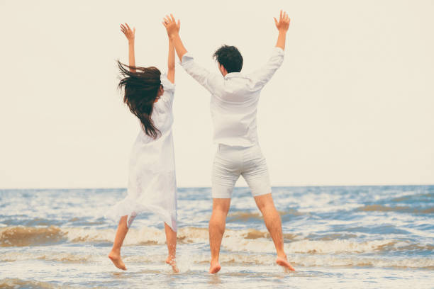 istock Couple going honeymoon on tropical beach in summer 1124297711