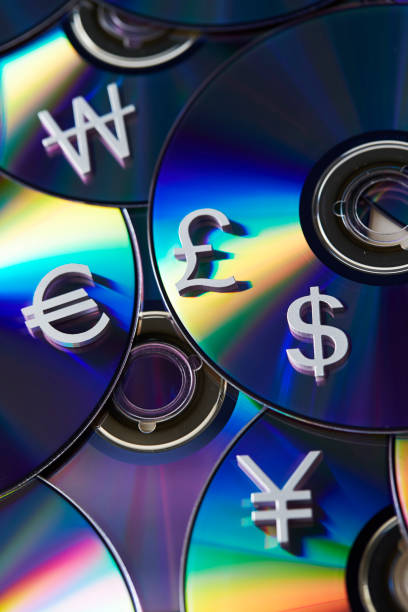 dvd with currency symbols - won symbol audio imagens e fotografias de stock