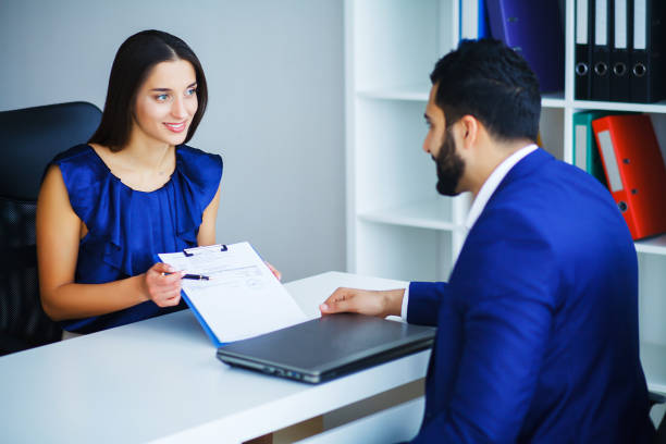 istock Portrait of two business people at work 1124304063