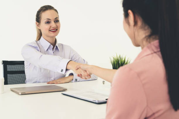 istock Two young business women meeting for interview. 1124304719
