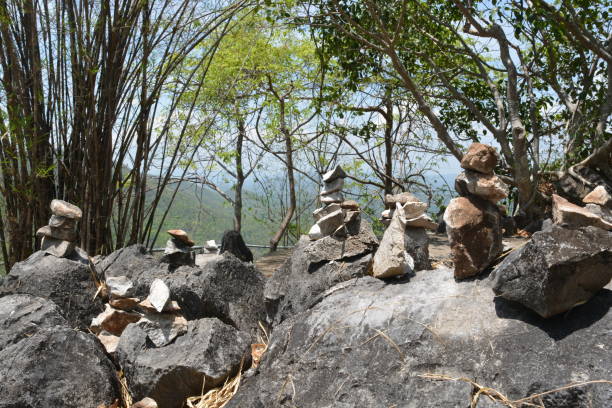 Rock formation with small rocks totem stock photo