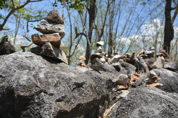 Rock formation with small rocks totem stock photo