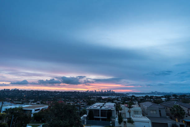istock Generic cityscape on a cloudy day in dusk sunset 1124311985