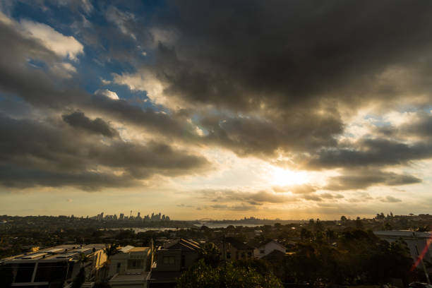 istock Generic cityscape on a cloudy day in dusk sunset 1124311993