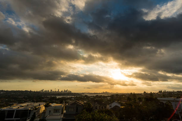 istock Generic cityscape on a cloudy day in dusk sunset 1124311995