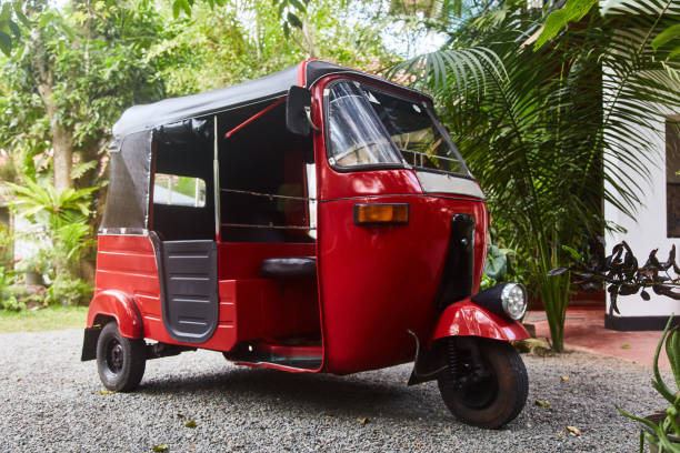 Red Tuk-tuk taxi on road of Sri Lanka. Ceylon travel car. Red Tuk-tuk taxi on road of Sri Lanka. rickshaw. Ceylon travel car. Hikkaduwa, Sri-Lanka. taxi sri lanka stock pictures, royalty-free photos & images