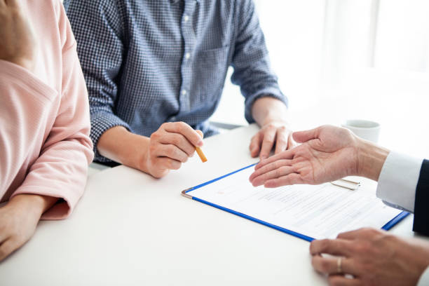 istock A couple who signs a contract at a new residence 1124316082