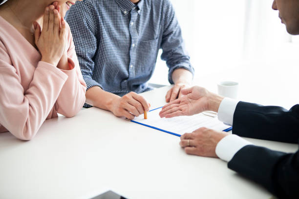 istock A couple who signs a contract at a new residence 1124316087