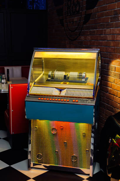 istock Jukebox in retro style. Automatic music player in cafe bar 1124321997