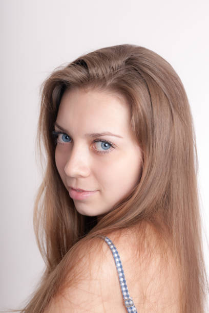 istock girl with long hair 1124333343