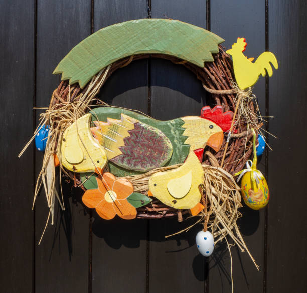 istock Handmade Easter decoration with hen and chicks in colored wood 1124333611