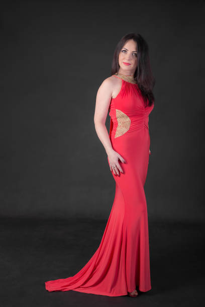 istock woman in a long red dress 1124334885